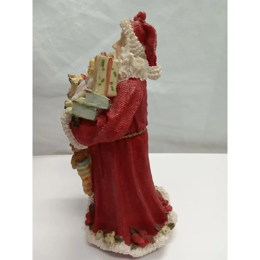 Santa Figurine  ceramic‎ holding gifts appox 9x5x5